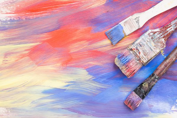 top view colorful brushstroke dirty paint brushes. High resolution photo